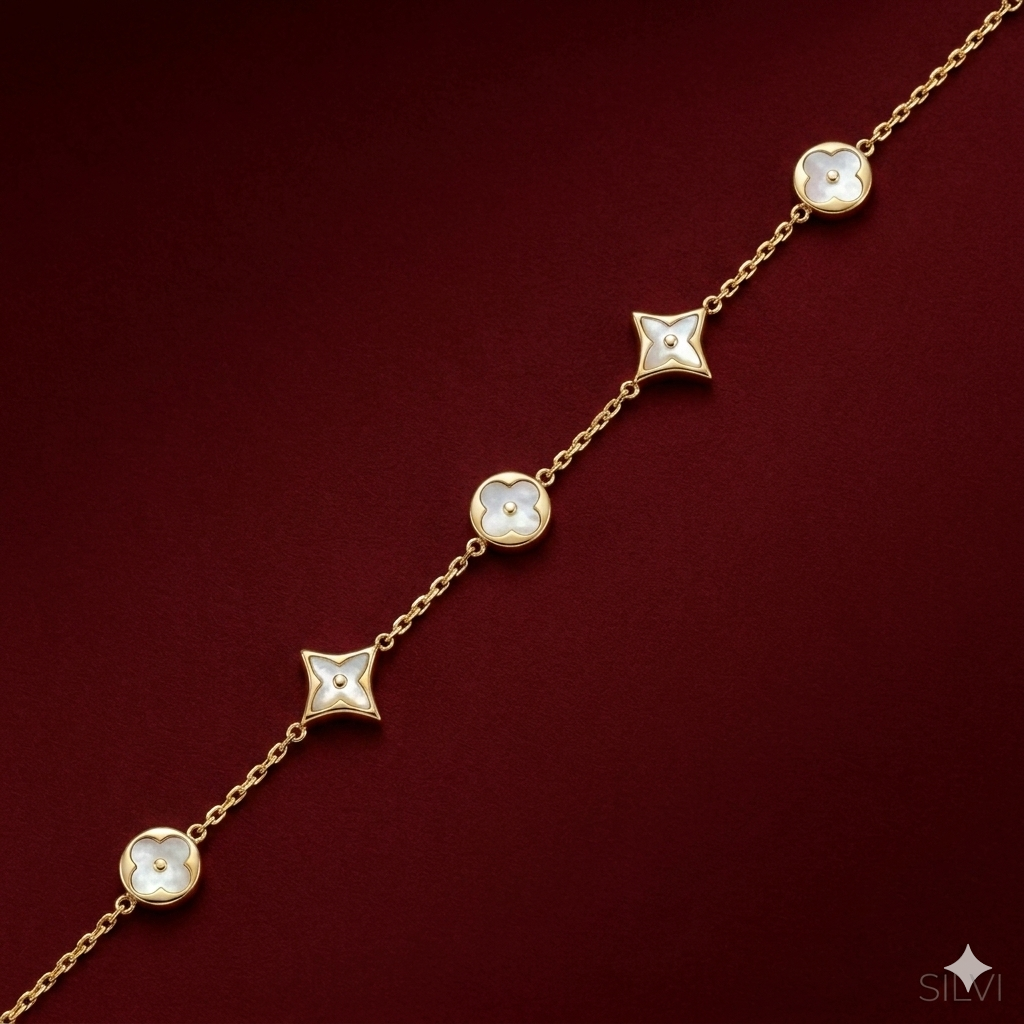 Gold plated white charm bracelet