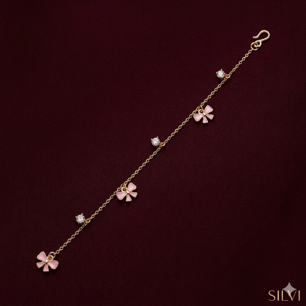 Pink bow and moissanite bracelet