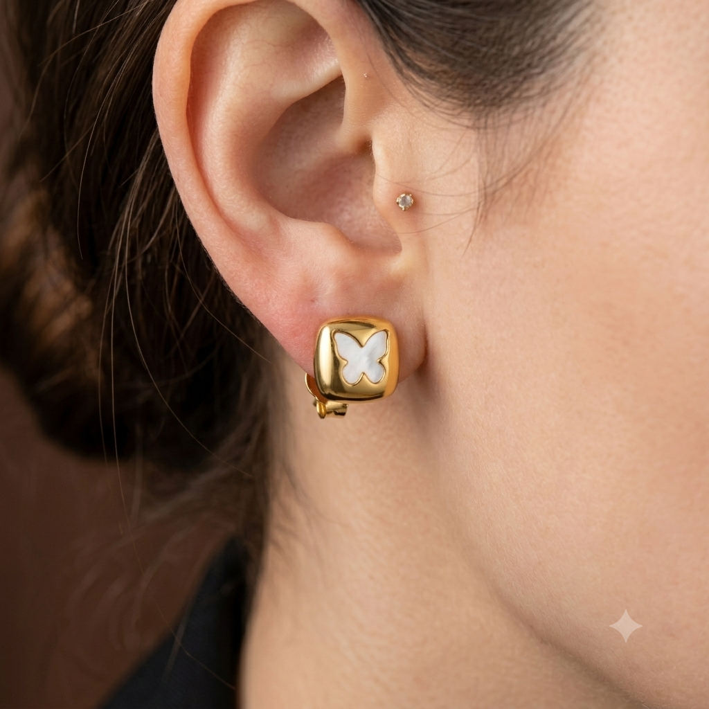 White butterfly gold earrings