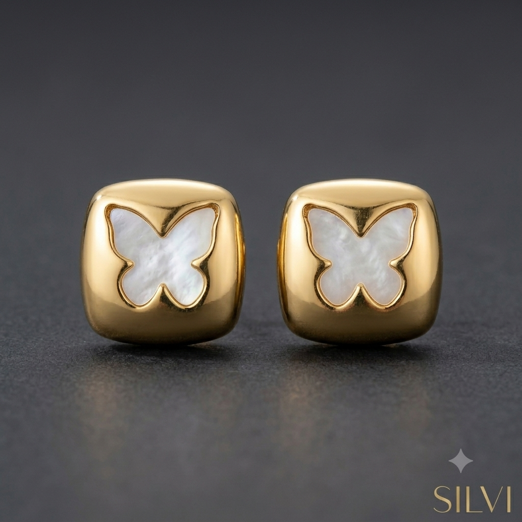 White butterfly gold earrings