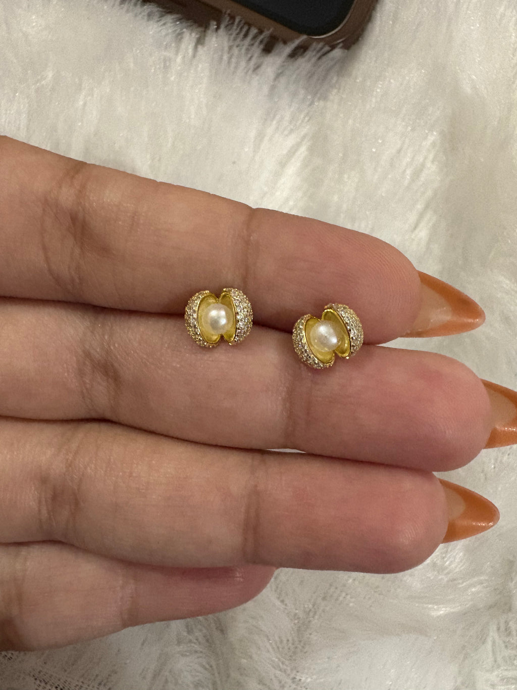 Gold plated pearl in shell earrings