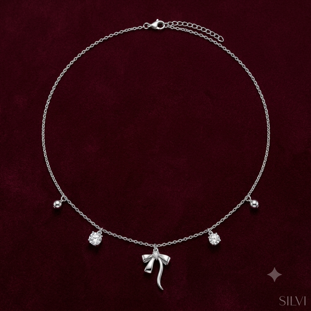 Silver bow necklace