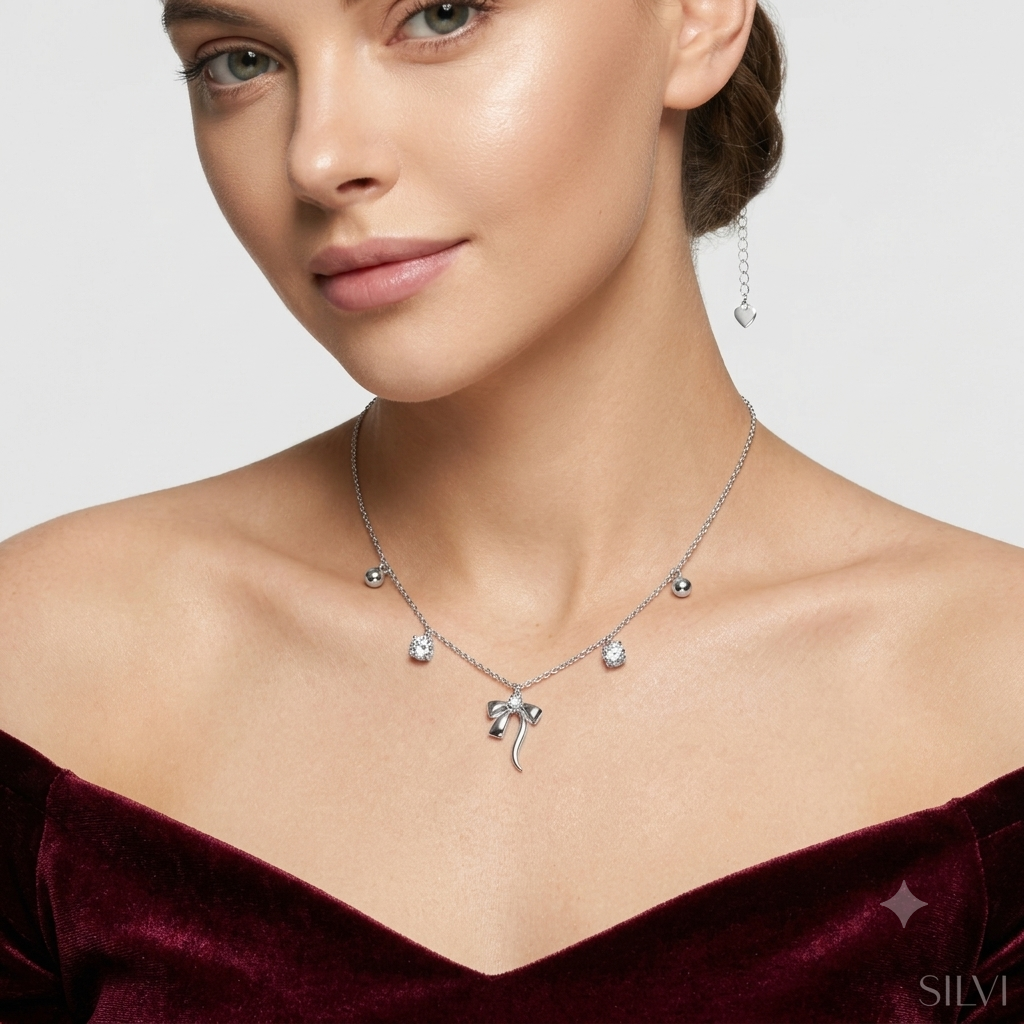 Silver bow necklace