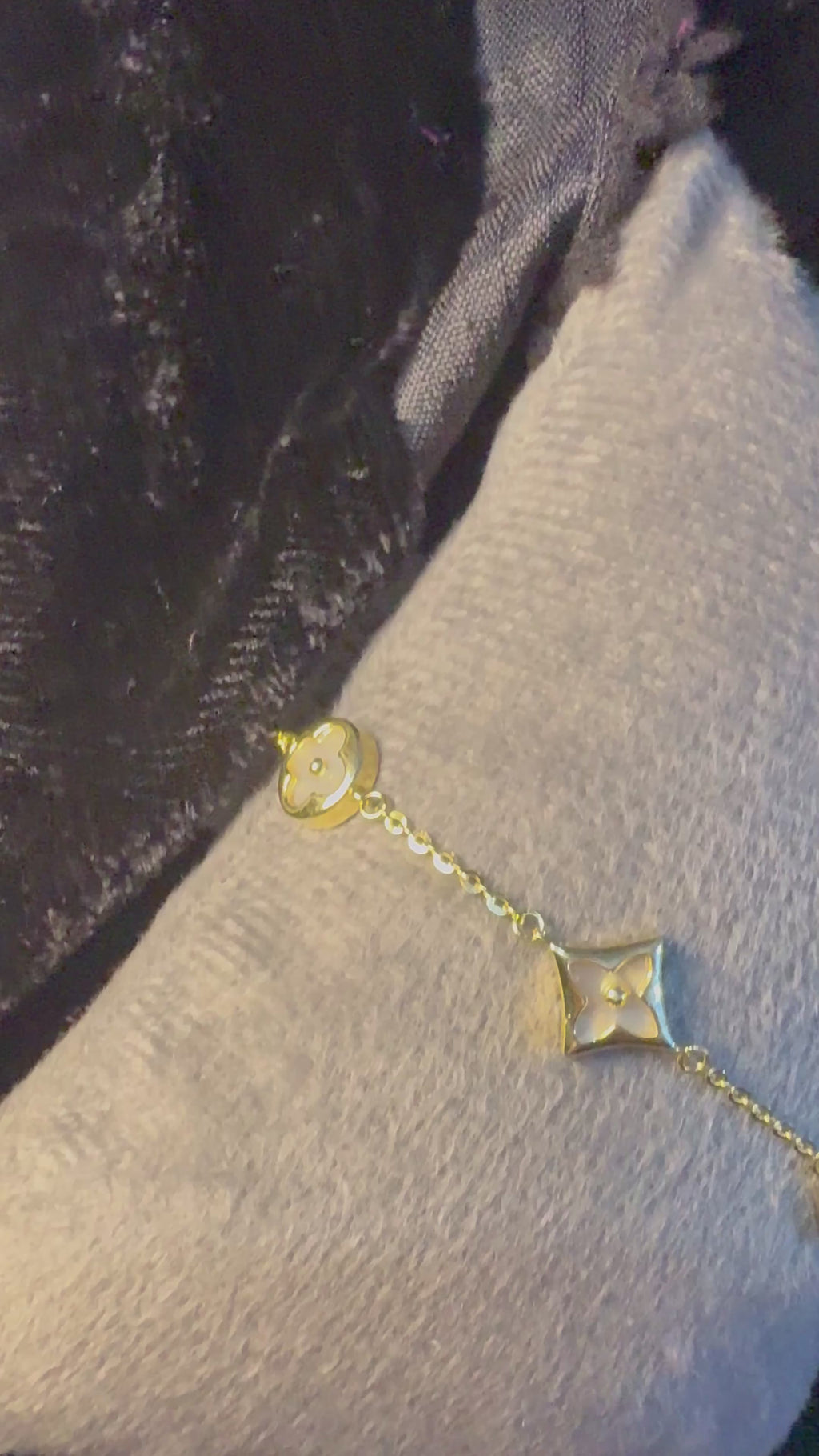 Gold plated white charm bracelet